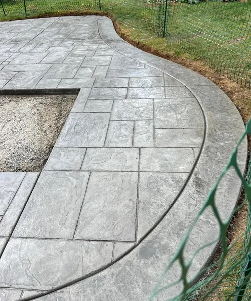 Decorative Stamped Concrete Patio With Integral Color And Decorative Borders in Renton 